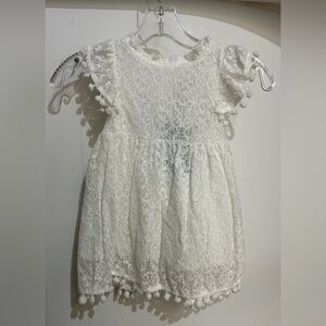 White Lace Boho Baby Dress with Pom Pom Sleeves